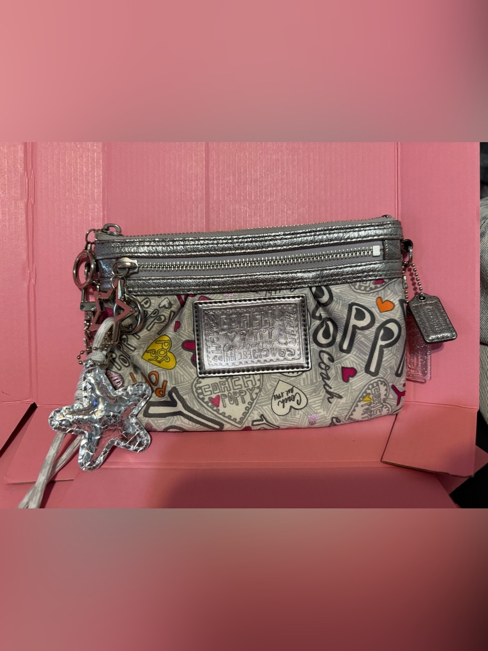 Coach Metallic Silver Graffiti Print Wristlet with Star Charm